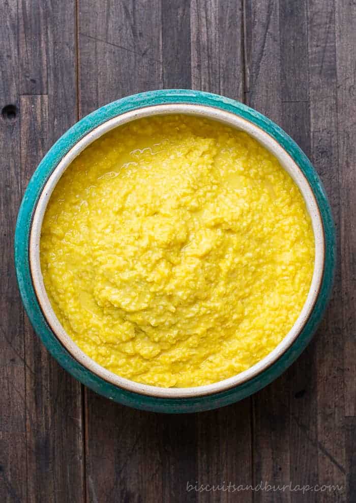 creamed corn overhead in blue pottery bowl