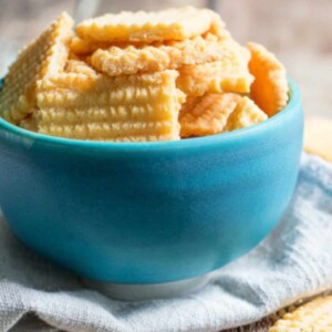 cheese straws in blue bowl.