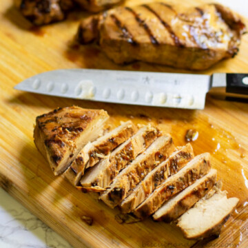 chicken on board with knife.