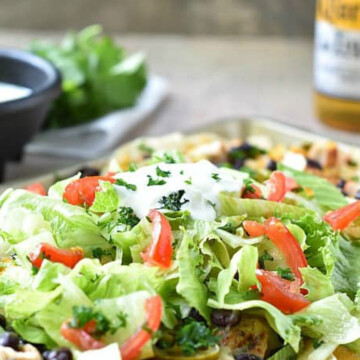 nachos on pan with beer.