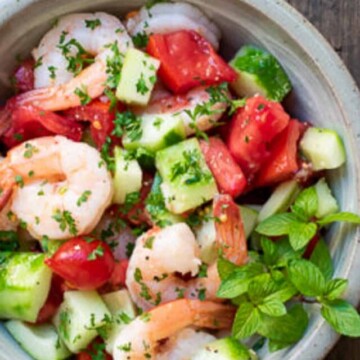 shrimp cucumber salad in bowl.