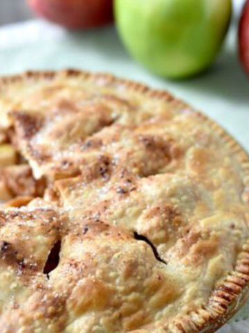 apple pie with slice out.