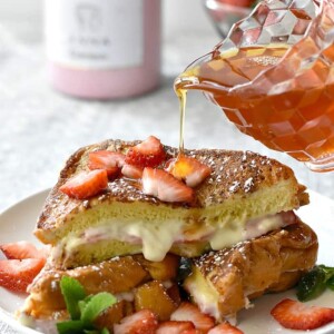 french toast with syrup being poured