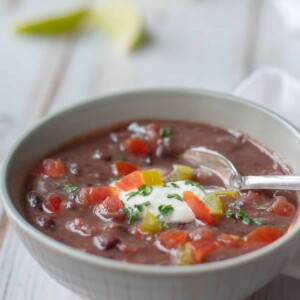 black bean and ham soup with garnishes on top