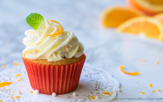 Orange cupcakes with cream cheese orange frosting from BiscuitsandBurlap.com