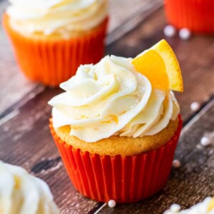 orange cupcakes on board
