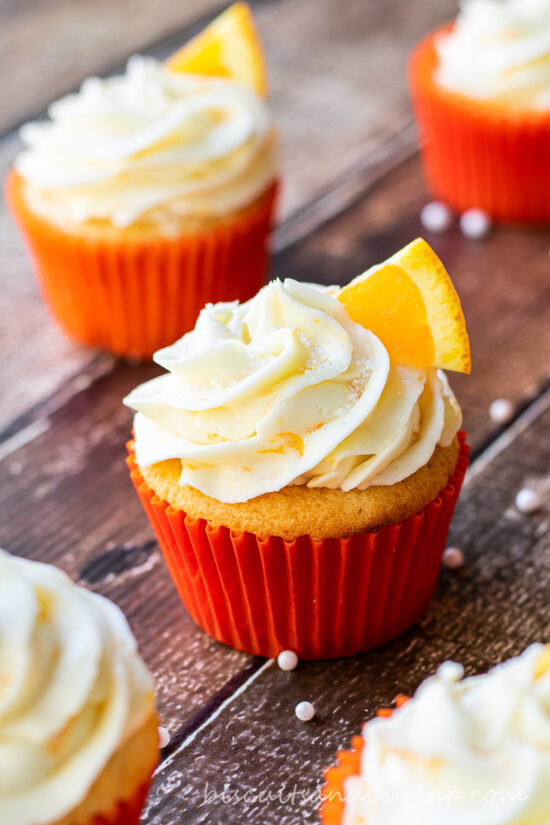 orange cupcakes on board