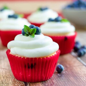 blueberry cupcake with more behind.