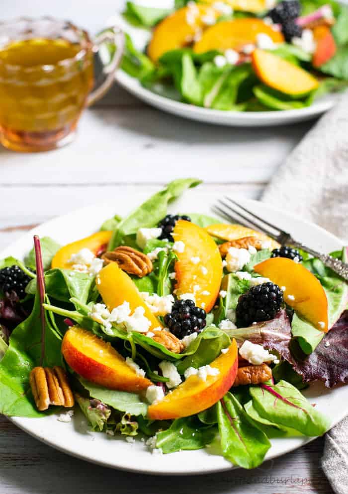 Salad with peaches, blackberries, pecans and basil vinaigrette