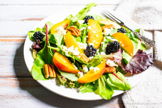 Salad with peaches, blackberries, pecans and basil vinaigrette