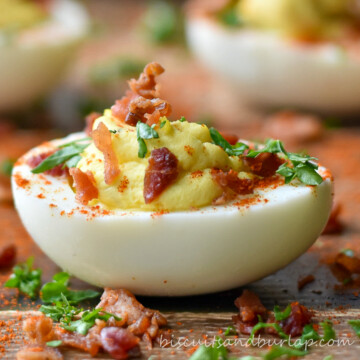 bacon jalapeno deviled egg on board.