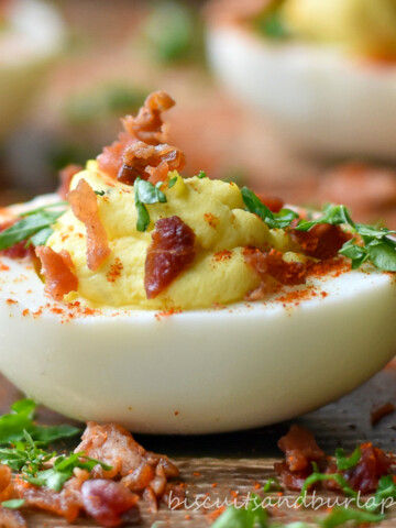 bacon jalapeno deviled egg on board.