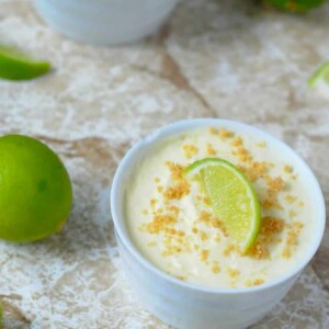 key lime pie pudding shot in white cup.