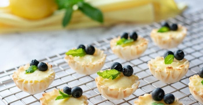 mini lemon tarts are perfect small bite sweets for any occasion