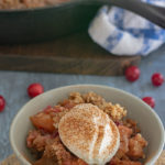 Apple Crisp with Cranberries is the perfect fall dessert baked in an iron skillet.