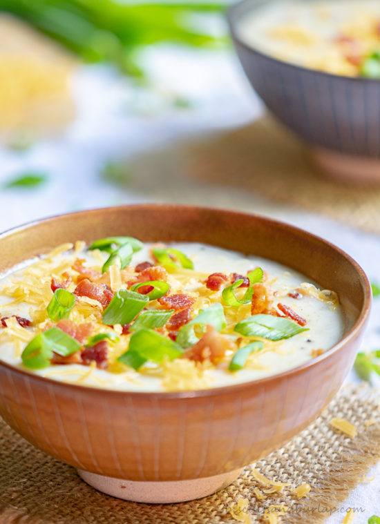 This easy potato soup comes together easily using baked potatoes and is just the way you like it when garnished with all of your favorite toppings.