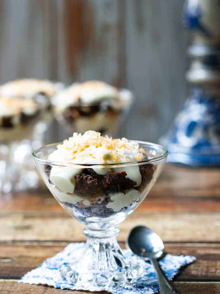 mini chocolate trifles layers of brownie crumbles, creamy cheesecake and toasted coconut