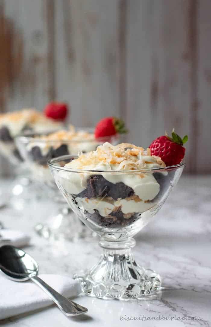 mini chocolate trifles layers of brownie crumbles, creamy cheesecake and toasted coconut
