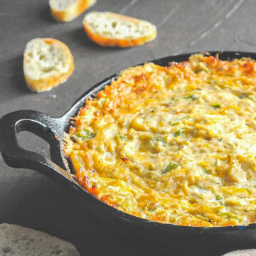 cajun crab dip in iron skillet.