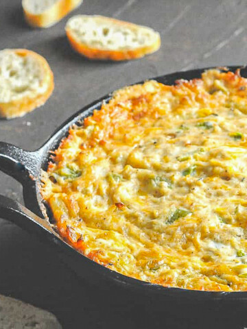 cajun crab dip in iron skillet.