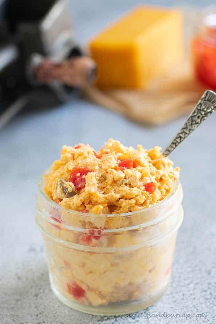 Spicy pimento cheese in a jar on the backyard bbq menu