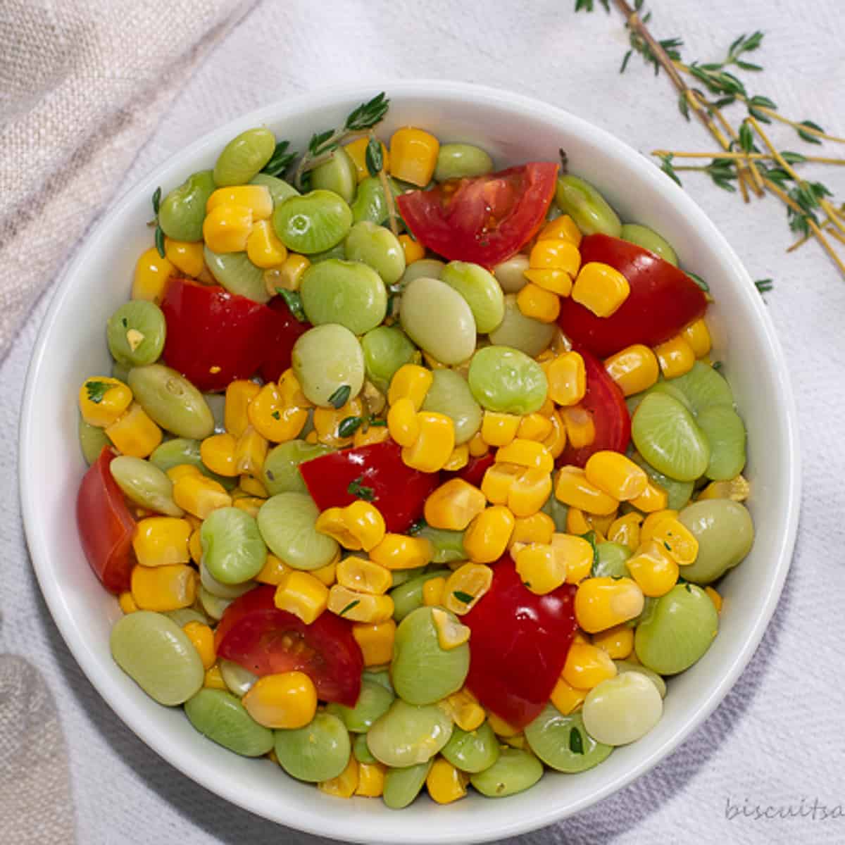 succotash in white bowl.