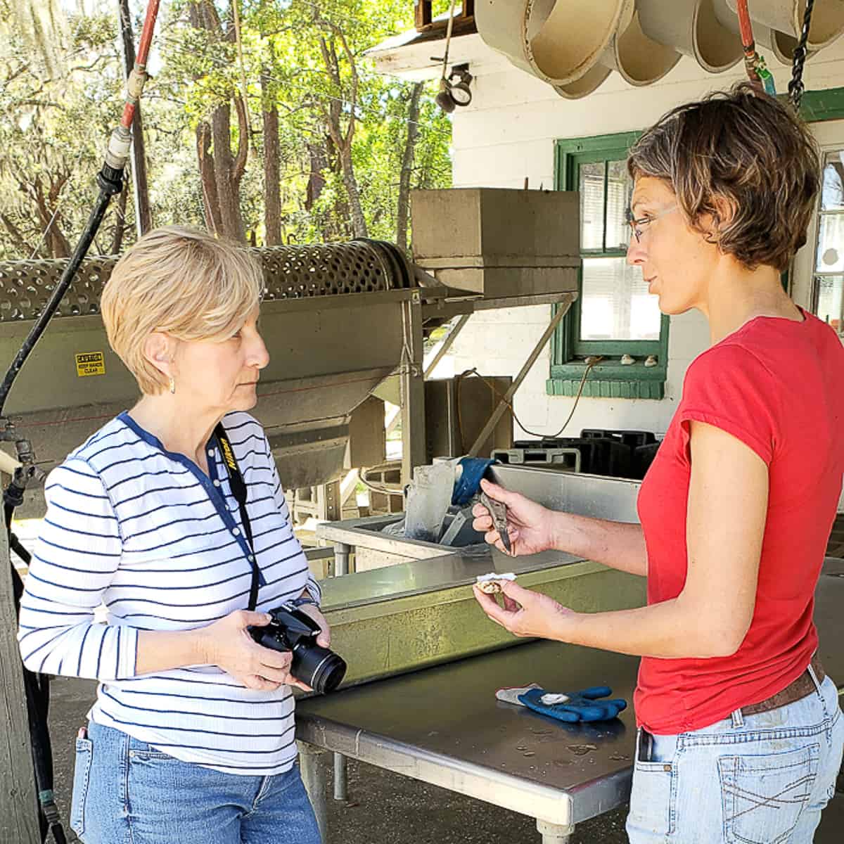 2 women at oyster farm.