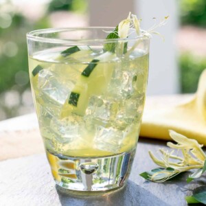 cocktail with cucumbers in glass.