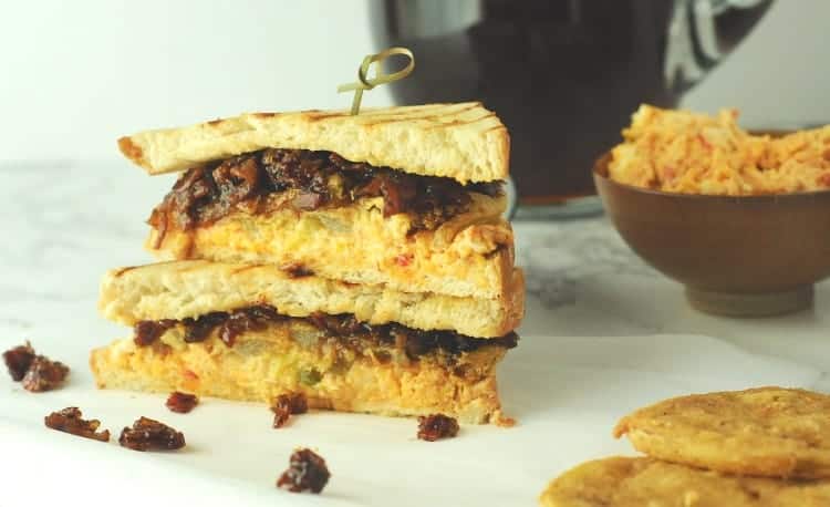 sandwich with fried green tomatoes, pimento cheese, and bacon bourbon jam