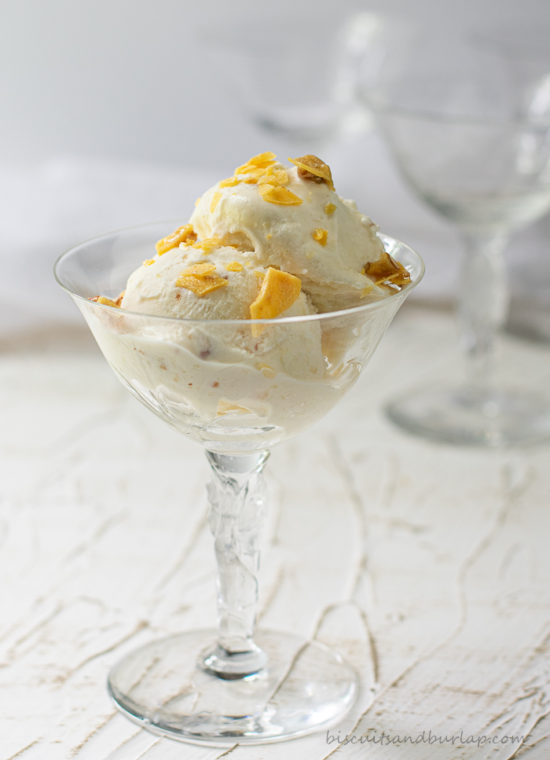 ice cream in champagne glass with pecan brittle on top