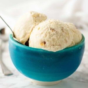 blue bowl with 3 scoops of ice cream.