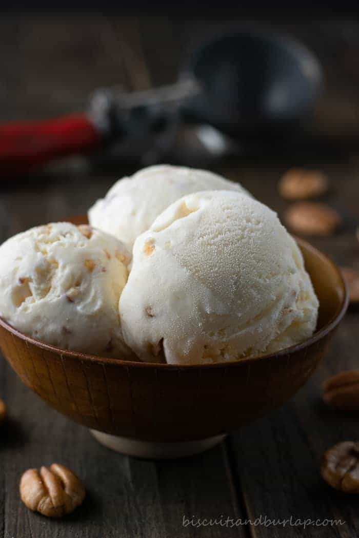 3 scoops of ice cream in brown pottery bowl