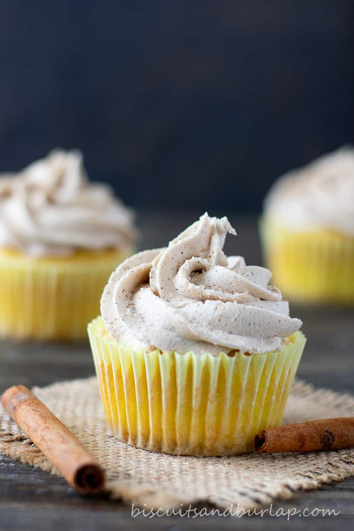 cupcake with cinnamon stick and more cupcakes behind