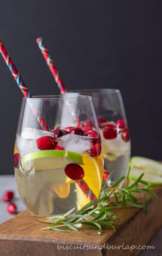 2 white sangrias with red straws