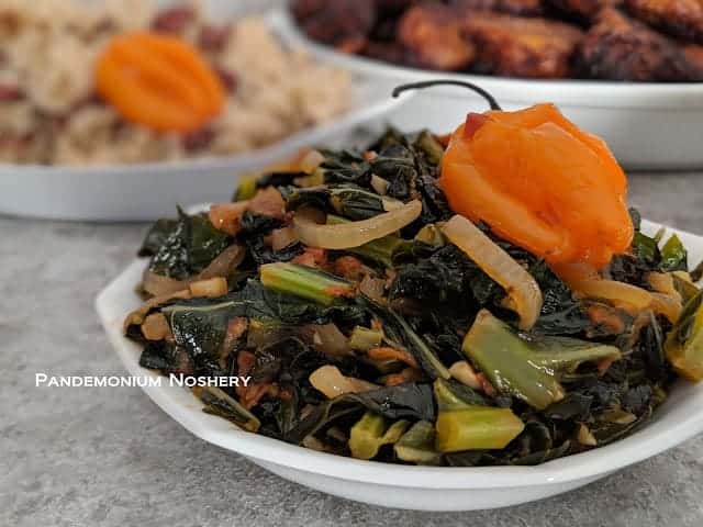 collard greens callaloo topped with a habanero pepper