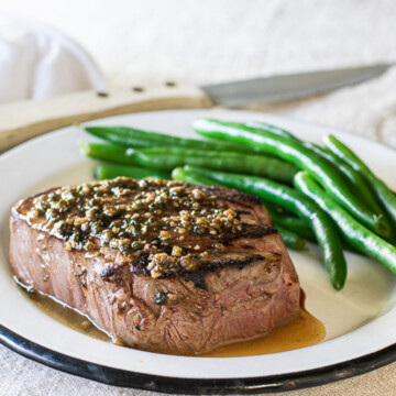 steak with bourbon peppercorn sauce.