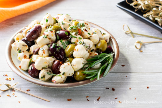 bowl of mozzarella pearls and olives