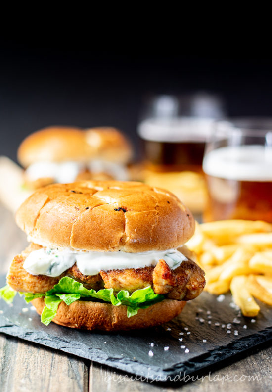 chicken sandiwch with fries and beer