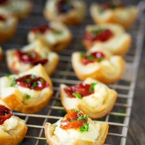 goat cheese appetizers in rows on rack