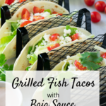 pin image of grilled fish tacos in stand.