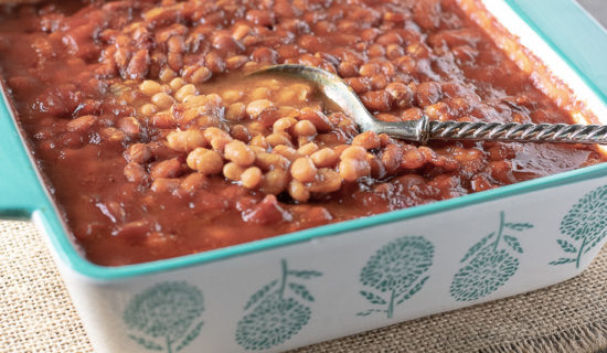 beans in dish with spoon