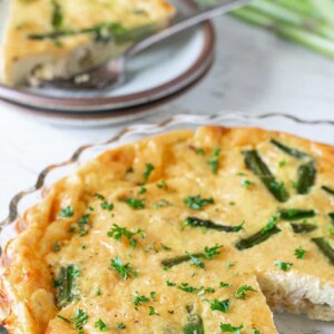 cajun chicken quiche with slice behind