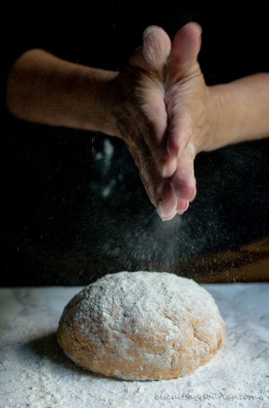 hands making biscuits