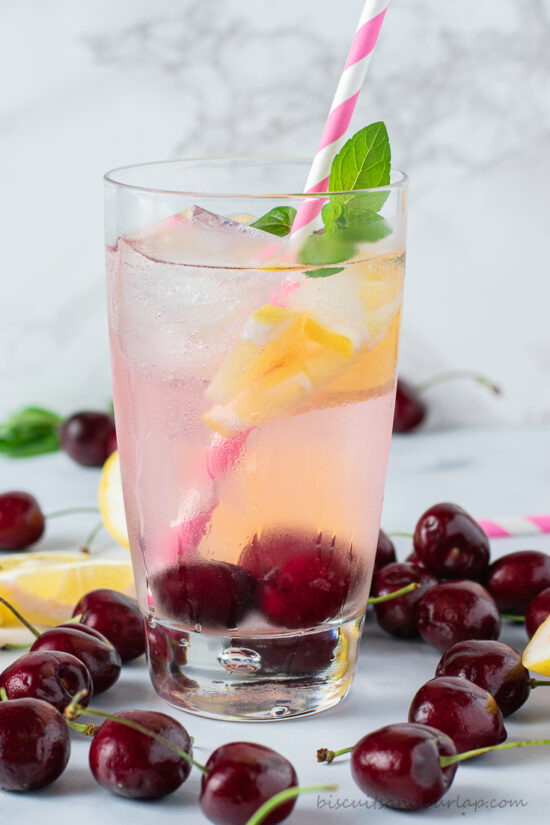glass of cherry infused water