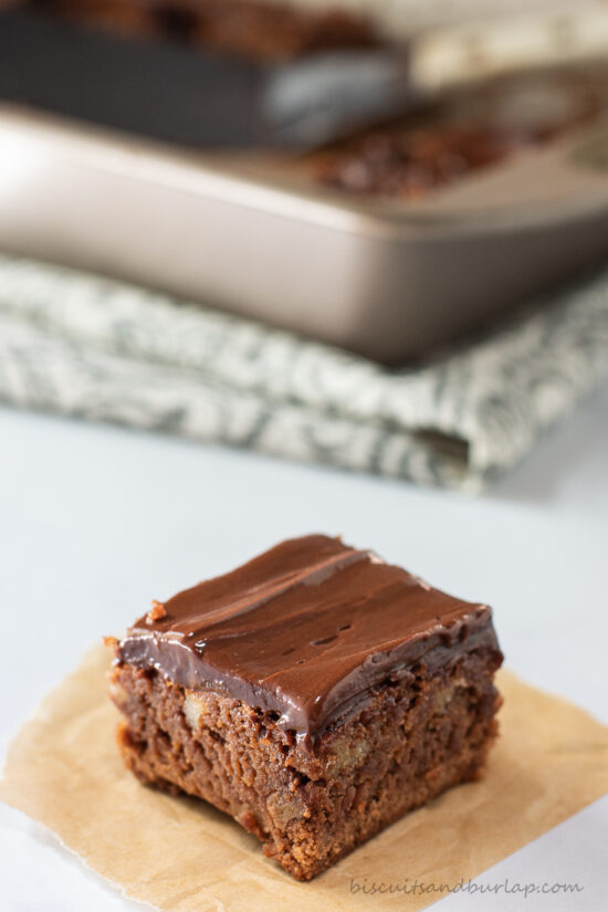 one brownie in front of pan