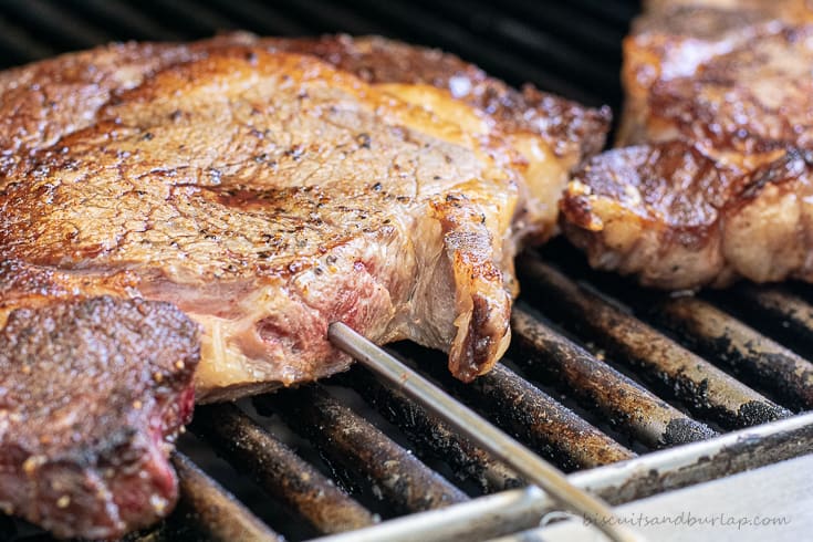 thermometer probe in side of reverse sear steak