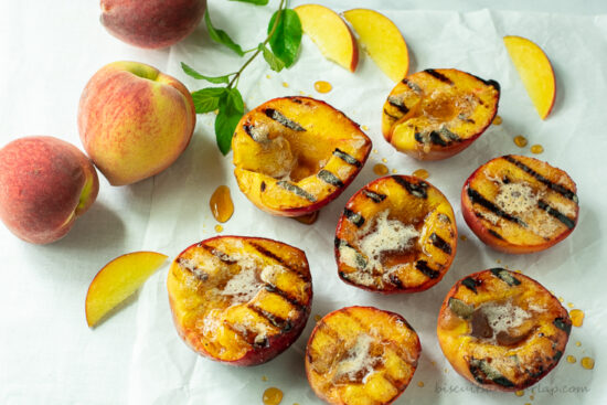 grilled peach halves with whole peaches