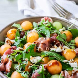 melon and prosciutto salad with balsamic drizzle