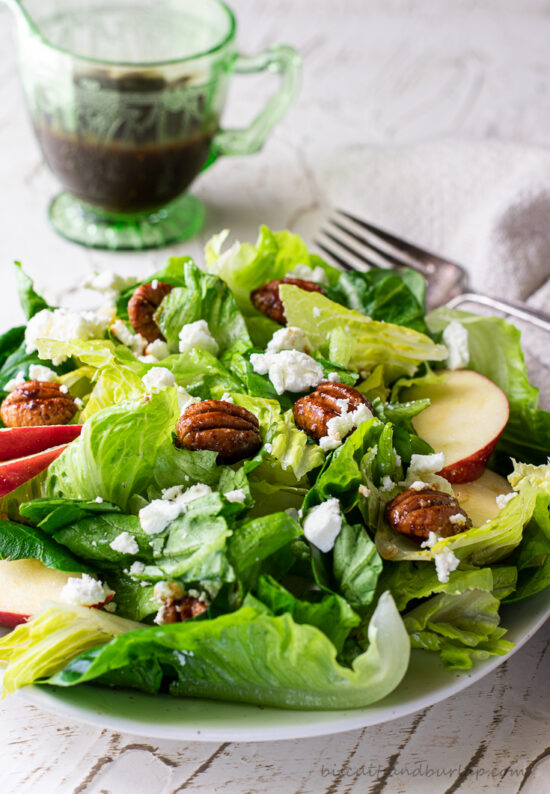 fall green salad on white plate