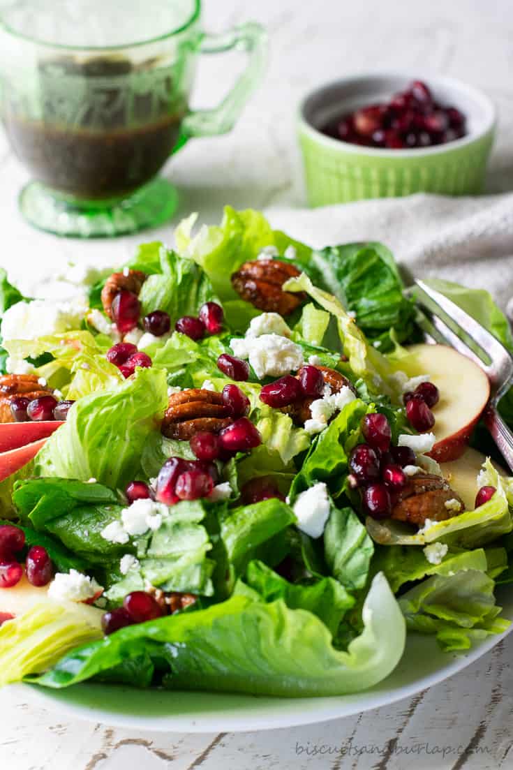 fall green salad with pomegranate seeds